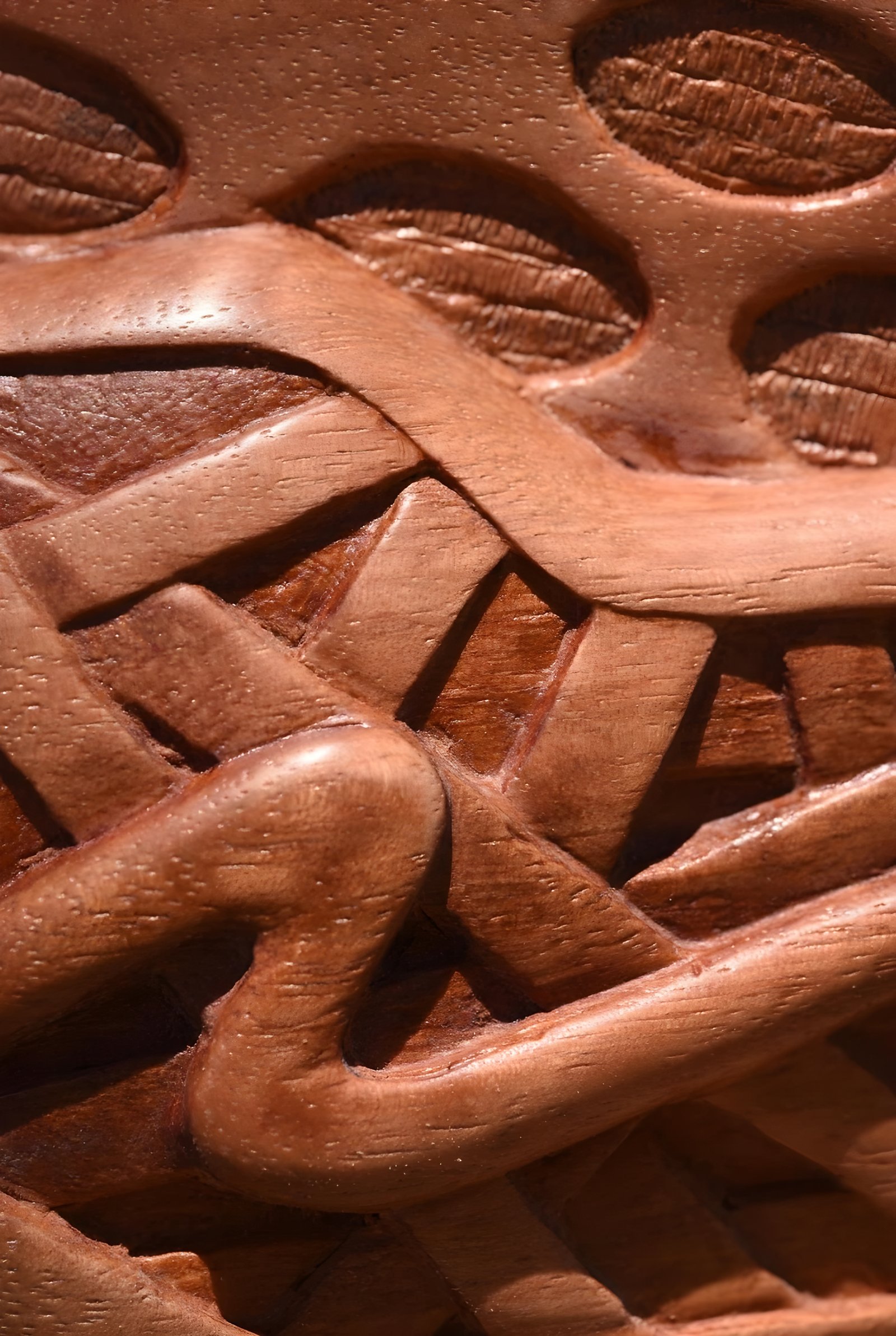 Interlaced forms carved in wood