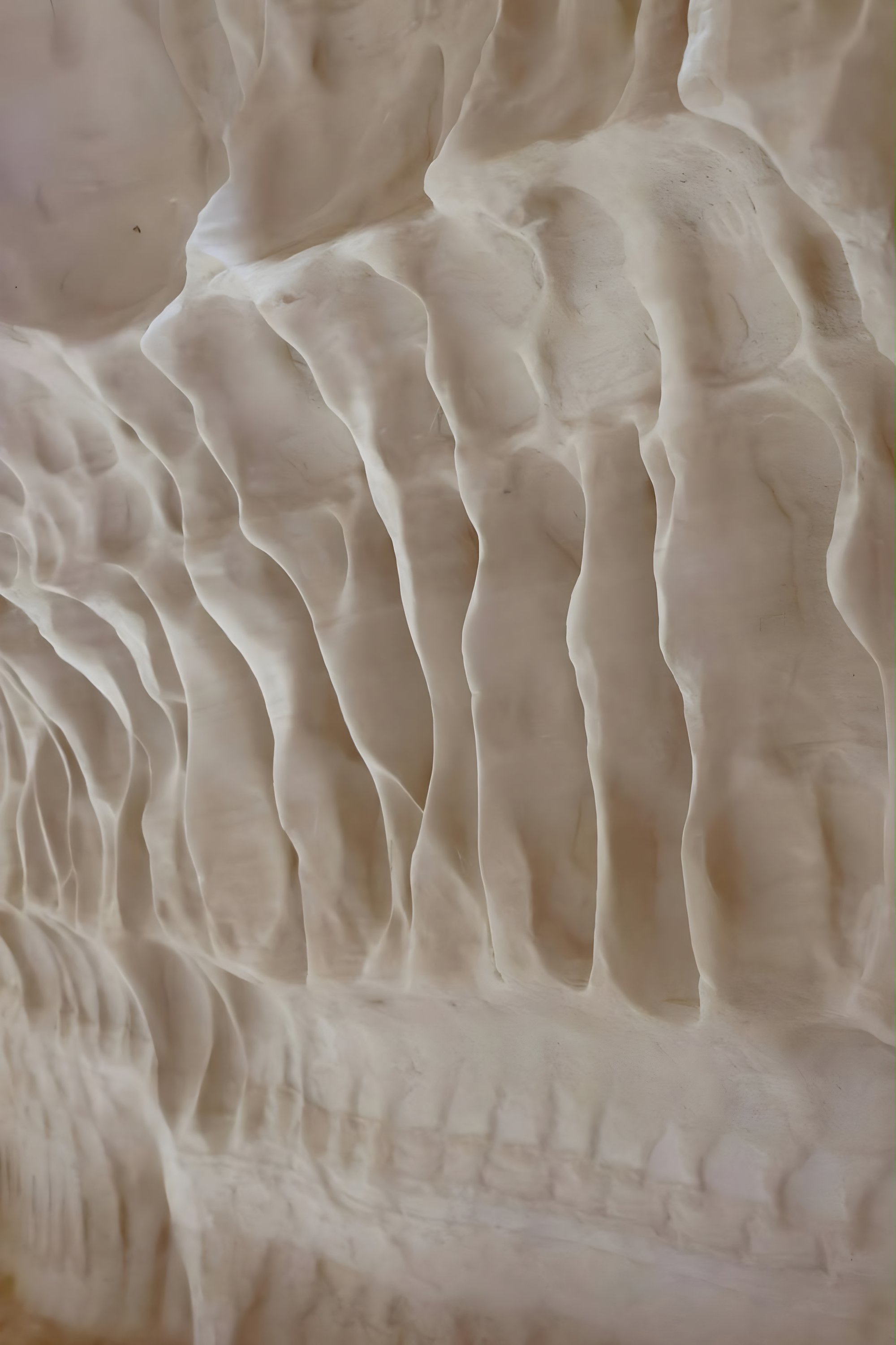 Soft folds of white plaster