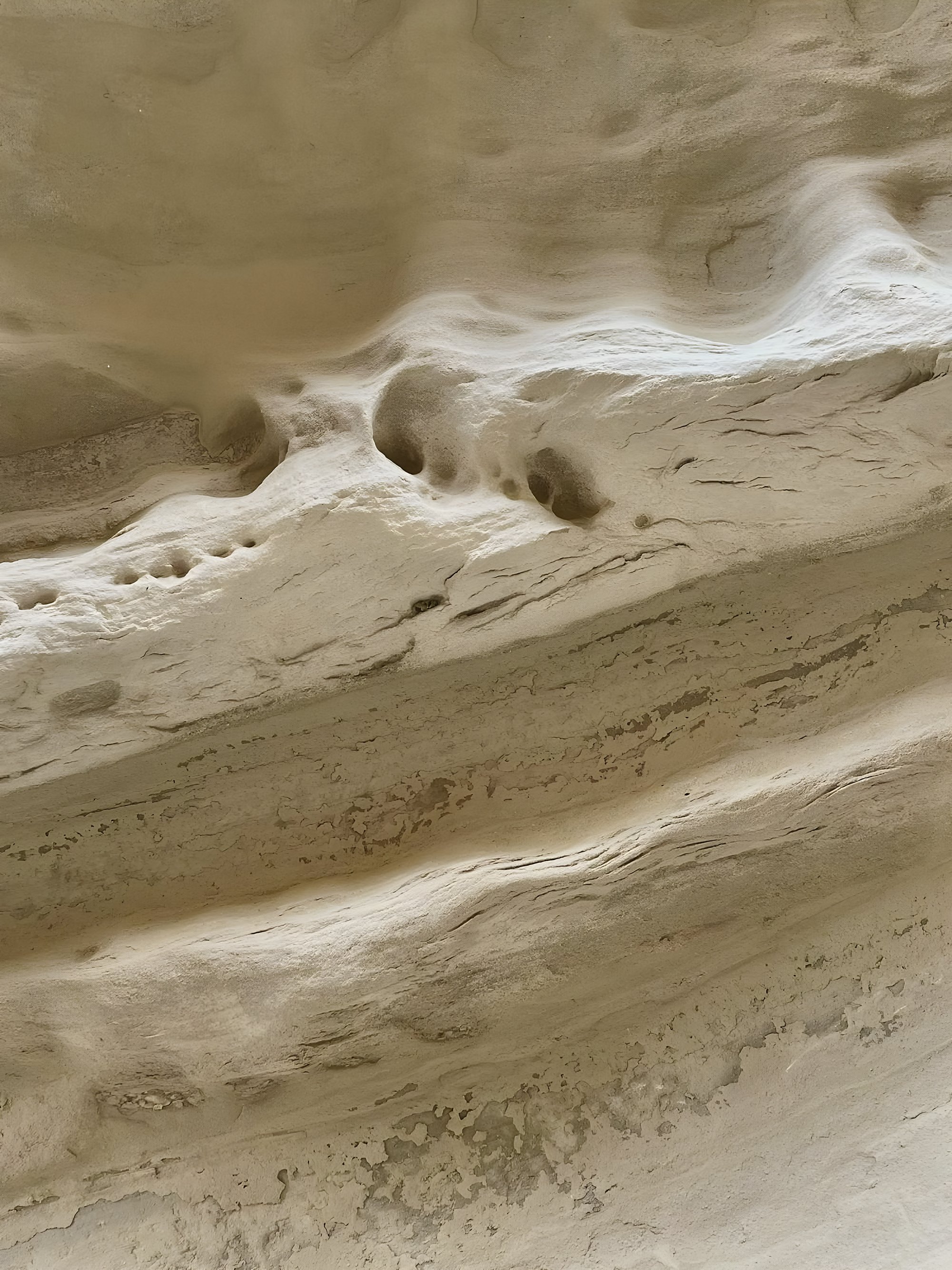 Stone shaped by water and by hand